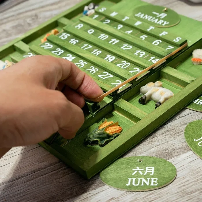 Calendrier perpétuel vintage en bois vert