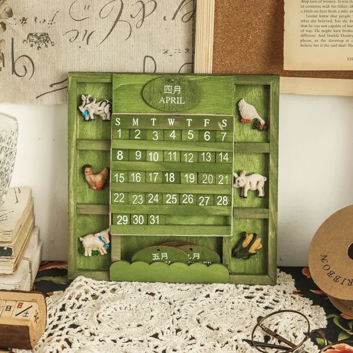 Calendrier perpétuel vintage en bois vert