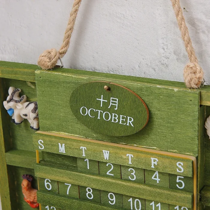 Calendrier perpétuel vintage en bois vert