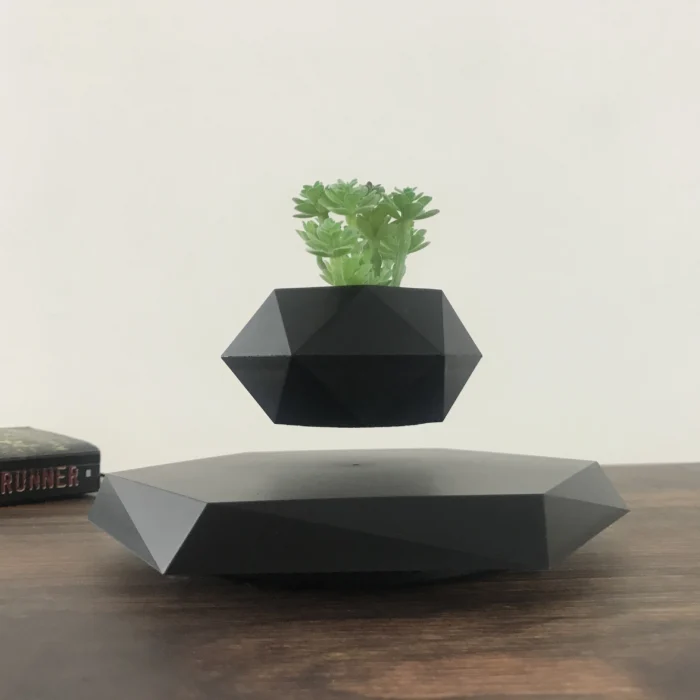 Vase de plante magnétique noir en lévitation
